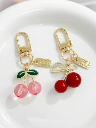 1 件甜美金色樱桃钥匙扣、包包挂件、耳机盒配件