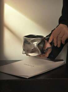 This Dark Butterfly Style Cup Has A Unique Design. With A Dark Tone, The Cup Body Features A Butterfly Relief, Embodying The Aesthetic Of Dark Beauty. The Material May Be Ceramic, Processed To Have A Metallic Luster. The Asymmetrical Cup Body Is Paired With A Curved Handle, Balancing Artistic Appeal And Comfortable Grip. Can Be Used As A Daily Drinkware Or Home Decor. Back To School