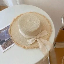 1 pieza Sombrero de playa para mujer, sombrero de paja de borde ancho con moño en la parte superior, sombrero de sol protector para viajes. Si el sombrero está ligeramente comprimido al recibirlo, consulte las instrucciones de cuidado para su restauración adecuada.