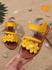 1 paire de sandales de plage mode pour adolescentes roses, en matériau PU souple et unicolore, avec décoration florale brillante, design à bande avec fermeture , bout rond, confort plat, sandales romaines mignonnes, convient aux filles de 3 à 15 ans, pour un usage quotidien, la plage, nouveautés d'été