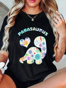 Camiseta de algodón negro de 180 g con cuello redondo y manga corta con estampado gráfico de Parasaurus floral para mujer, camiseta informal suave de dinosaurio para mujer, camiseta divertida de moda de verano, ajuste cómodo y relajado, diseño novedoso de moda, regalo para ella - Negro - Ver 1