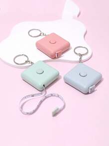 1 pièce Règle carrée automatique de style nordique, de couleur bonbon, mini mètre à ruban petit pour mesurer les vêtements. Mètre à ruban petit de 1,5 mètres avec corde de suspension, mesure automatique de la rétractation, trois circonférences, mètre à mesurer souple, mesures métriques et impériales, multifonctionnel pour la mesure de la longueur, usage de bureau