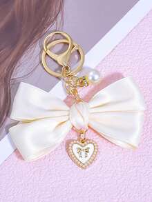 1pc Bowknot Bag Charm, A Bag Accessory, And An Faux Pearl Keychain. It's A Perfect Mother's Day Gift. This Cute Faux Pearl Beaded Bracelet-Style Keychain Exudes A Vintage Charm. It Is Suitable For Decorating Ladies' And Girls' Handbags, Backpacks, And Even Cars. The Pearl Pendant Adorned With A Ribbon Is Also An Excellent Choice For Valentine's Day And Birthday Gifts. - Multicolor - View 26
