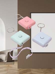 1 pièce Règle carrée automatique de style nordique, de couleur bonbon, mini mètre à ruban petit pour mesurer les vêtements. Mètre à ruban petit de 1,5 mètres avec corde de suspension, mesure automatique de la rétractation, trois circonférences, mètre à mesurer souple, mesures métriques et impériales, multifonctionnel pour la mesure de la longueur, usage de bureau