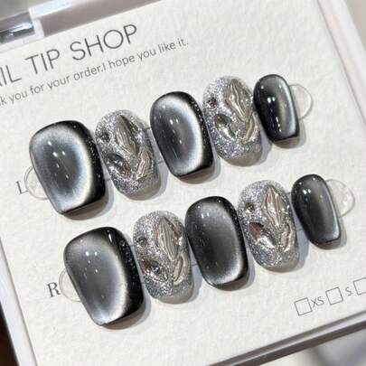 10片美甲贴纸，DIY超大猫眼星空图案，黑色可拆卸可重复使用指甲贴，适用于舞台、舞蹈、舞会、派对等场景。内含1盒指甲胶和1个指甲抛光器。按压式美甲用品