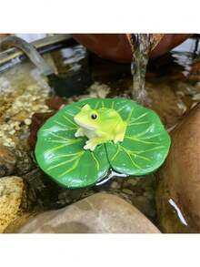 树脂青蛙雕像漂浮在荷叶上 - 独特的绿色青蛙，黑眼睛，白肚子，非常适合花园池塘、泳池装饰和季节性庆典装饰 | 动物雕塑 | 逼真的青蛙雕像，青蛙花园装饰