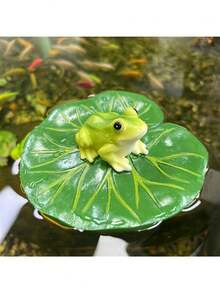 树脂青蛙雕像漂浮在荷叶上 - 独特的绿色青蛙，黑眼睛，白肚子，非常适合花园池塘、泳池装饰和季节性庆典装饰 | 动物雕塑 | 逼真的青蛙雕像，青蛙花园装饰