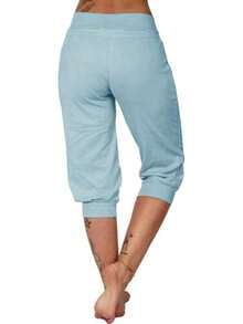 Fisoew Pantalones de yoga ajustados capri para mujer, pantalones de pijama holgados con cordón y bolsillos. - Azul cielo - Ver 3