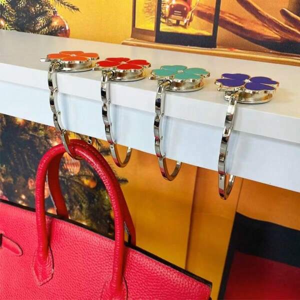 1pc Elegant Clover White Design Foldable Handbag Hook - Chic Aluminum Alloy Purse Table Hook With Heart-Shaped Floral Accent, Portable Metal Bag Holder For Stylish Accessory Lovers