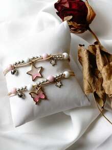 Dos pulseras hermosas con forma de estrella de mar y horario de Jiayu Ceramics, una pareja de pulseras, un regalo para tu ser querido. Las pulseras se pueden extender y contraer libremente en tamaño. Son perfectas para regalar a amigos, parejas, padres o como pequeños regalos para fiestas en verano