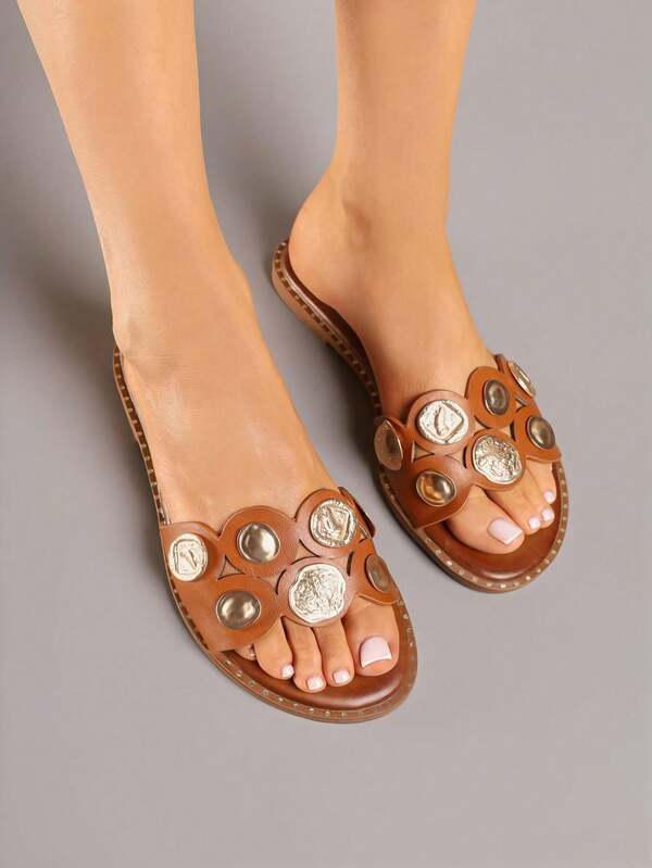 Flip-Flops With Metallic Decorations