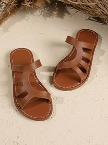 1 Pair Brown Toddler/Kids Plus Size Hollow Slide Sandals, Soft PU Upper, Slip-On, Non-Slip Durable TPR Sole, Solid Color Simple Roman Design, Suitable For 3-15 Year Olds Boys Girls, Beach, Vacation, Casual Wear, 2025 New Arrival - View 1