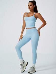 NcmRyu 1 套女士无缝弹力性感交叉后背运动文胸和紧身裤运动服套装 - 藍色 - 查看 9