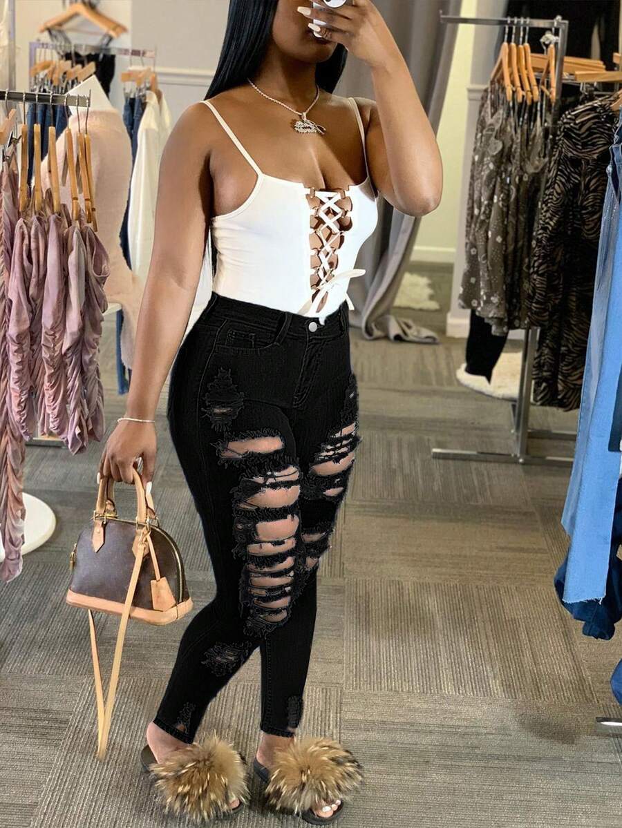 Quần jeans skinny rách màu đen dành cho nữ cỡ lớn, quần denim co giãn gợi cảm, phong cách đường phố thời thượng cho mùa xuân. - màu đen - Xem 1