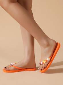 伊娃女士平底人字拖，时尚、轻便、舒适，适合夏季户外休闲穿着，是夏季、海滩、旅行和其他场合的理想之选。 - 亮橙色 - 查看 5