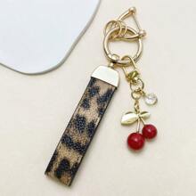 TTOBS 1pc Exquisitely Crafted Leopard Print Leather Car Key Chain With Adorable Cherry Pendant - , Fashionable And Multi-Functional Backpack Keychain - The Perfect Accessory For Backpacks. The Perfect Valentine's Day Gift, Also An Ideal Gift For Your Beloved Girlfriend.