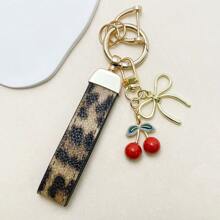 TTOBS 1pc Exquisitely Crafted Leopard Print Leather Car Key Chain With Adorable Cherry Pendant - , Fashionable And Multi-Functional Backpack Keychain - The Perfect Accessory For Backpacks. The Perfect Valentine's Day Gift, Also An Ideal Gift For Your Beloved Girlfriend.