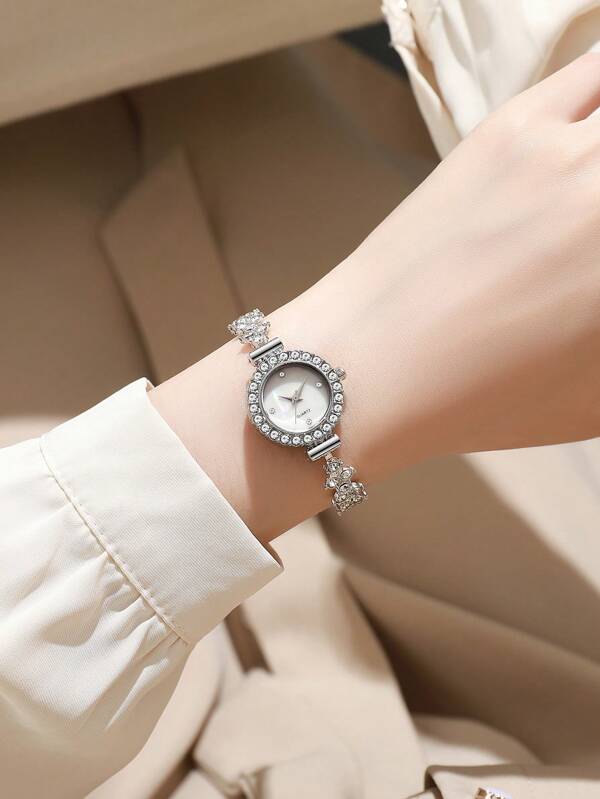 Reloj de pulsera de moda para mujer con esfera pequeña y redonda, banda de lujo completamente cubierta de diamantes de imitación y cristales, elegante reloj de cuarzo de aleación como regalo