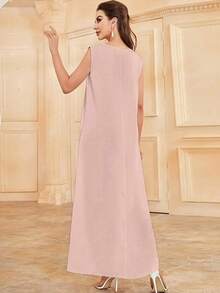 Vestido casual recatado de un solo color con cuello redondo y sin mangas