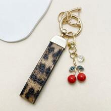 TTOBS 1pc Exquisitely Crafted Leopard Print Leather Car Key Chain With Adorable Cherry Pendant - , Fashionable And Multi-Functional Backpack Keychain - The Perfect Accessory For Backpacks. The Perfect Valentine's Day Gift, Also An Ideal Gift For Your Beloved Girlfriend.
