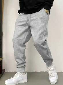 Pantalon de survêtement confortable à coupe ample pour hommes - Pantalon de sport noir, poches douces, style boyfriend, taille élastique avec cordon, couleurs unies pour toutes les saisons, port décontracté, relaxation et activités de plein air, pantalon de survêtement léger pour l'entraînement, la course, la salle de gym, l'exercice