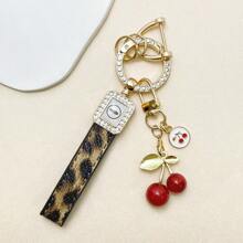 TTOBS 1pc Exquisitely Crafted Leopard Print Leather Car Key Chain With Adorable Cherry Pendant - , Fashionable And Multi-Functional Backpack Keychain - The Perfect Accessory For Backpacks. The Perfect Valentine's Day Gift, Also An Ideal Gift For Your Beloved Girlfriend.