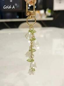1件兰花仿珍珠钥匙扣流苏吊饰钥匙扣、钥匙扣配件、包包吊饰、汽车钥匙扣、耳塞盒装饰，女士礼物。可爱珍珠兰花钥匙扣、创意流苏钥匙扣、背包吊坠、包包装饰、生日/派对礼物 - 彩色 - 查看 6
