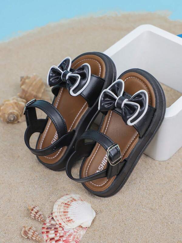 1 par de sandalias planas de unicolor para niñas con diseño de lazo y cierre de gancho y bucle, adecuadas para el verano