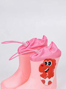 Une paire de bottes de pluie pour enfants pour toutes les saisons, anti-dérapantes et résistantes à l'usure, pour garçons et filles, avec un design en forme de dinosaure et de crocodile, imperméables et sans odeur, chaussures d'eau de sport, convenant aux jeux extérieurs et à l'habillement les jours de pluie, ainsi qu'aux voyages extérieurs pendant la saison des pluies