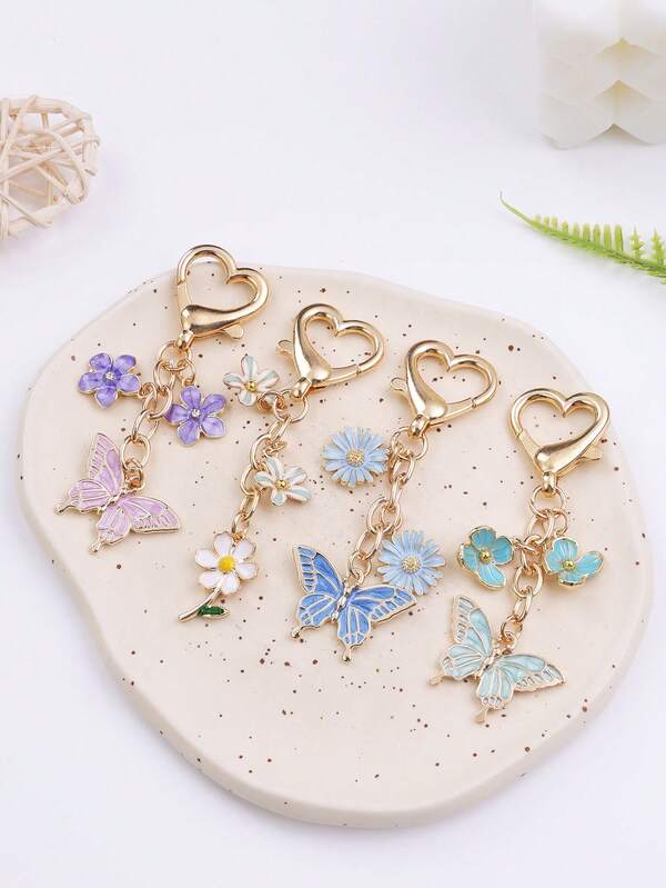 1 قطعة سلسلة مفاتيح زينة هاتف بشكل زهرة جميلة، حلقة مفاتيح فراشة ملونة، سلاسل مفاتيح حيوانات طائرة مطلية بالمينا، إكسسوارات حقيبة للنساء والفتيات، مجوهرات يدوية، هدية عيد الميلاد
