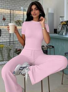 Spring And Autumn Women's Fashionable Navel-Baring Short-Sleeved Tops, Slim-Fitting Lace-Up Flared Pants Sports Suits