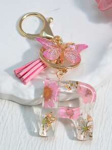 1 szt. Damski brelok z inicjałem i suszonym kwiatem, uroczy mini breloczek z stokrotką, ozdoba torby/plecaka, frędzel w kształcie motyla, akcesoria szkolne, akcesoria samochodowe, gotyckie smycze do torebek Y2k z uchwytem na identyfikator, zawieszki do torebek samochodowych - Słodki róż - Zobacz 31