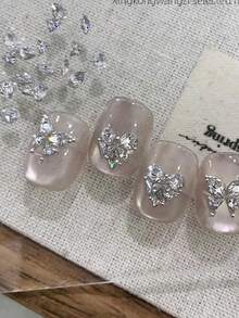 50/200 piezas de mini rhinestones de circonita blanca y rosa claro para uñas, 2-3 mm, con fondo plano y punta 3D, decoraciones de cristal sin olor para diseños de manicura, encantos y mosaicos, suministros para uñas - Blanco - Ver 6