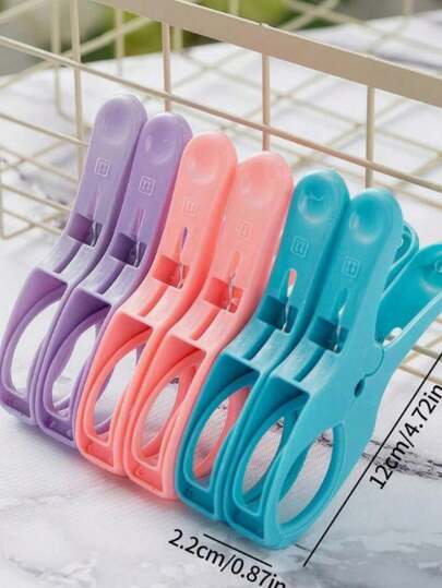 6 st/set Strandhandduksklämmor, Plaststrandhandduksklämmor, klädnypor, vindtäta klädklämmor, stora söta vindtäta klädnålar, plastklämmor, klämhållare för quilt, researtiklar, för torkning av poolstol vid stranden, starkt greppklämma för torkning av handdukar, kläder och kläder på stranden, täcken med handdukar och kläder, filtar 6st tunga strandhandduksklämmor i ljusa färger