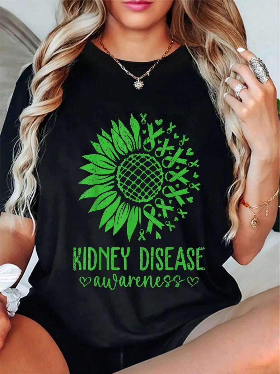 Camiseta negra de algodón de manga corta con cuello redondo y gráfico con estampado de girasol para concienciar sobre las enfermedades renales para mujer | Top informal, suave y transpirable de 180 g, ideal para quienes apoyan la salud renal | Camiseta cómoda de uso diario para mujer - Negro - Ver 1
