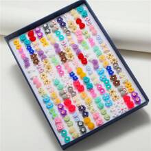 Set de 100 piezas de aretes con tachas geométricas de color dorado y blanco con rhinestones, aptos para uso diario de mujeres