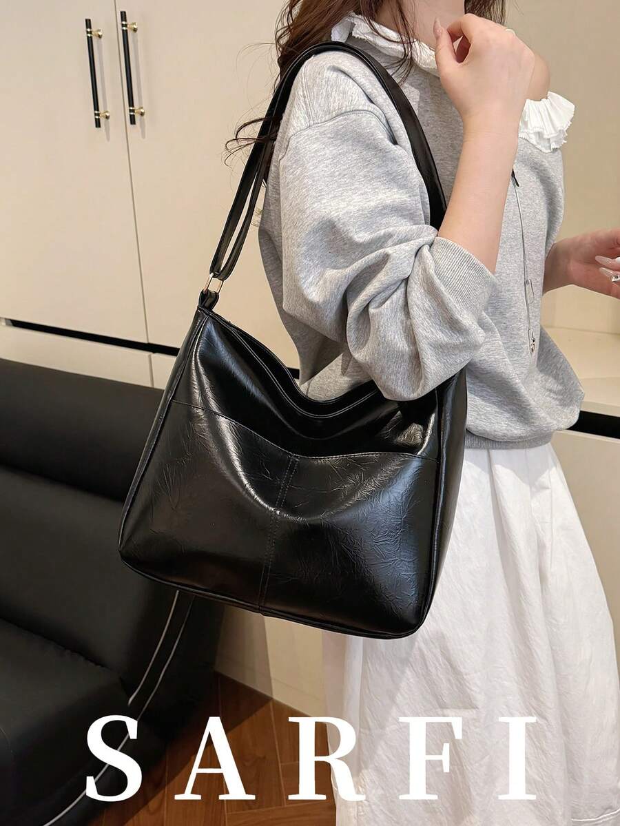 极简风格小众纹理面料女士单肩包，休闲纯色简约可调节肩带斜挎包，时尚极简便携通勤手提包，大学生日常旅行大容量收纳包，防水PU材质拉链封口女士手提包，适合朋友购物、约会、商务旅行及各种场合。