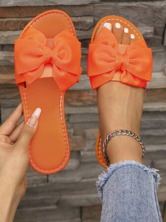 2024年夏季新款时尚女士蝴蝶结拖鞋，软底加大码沙滩拖鞋