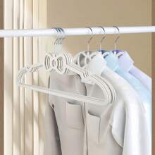 10pcs/20pcs 2025 Latest Popular Bow Plastic Hangers, 360° Rotatable Hooks, Storage Clothes, Underwear, Suspenders, Pants, Skirts, Etc., Suitable For Dormitories And Households, Tidying Up Wardrobes, Saving Space, Non-Slip And Traceless