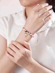 Bracelet en perles marbré rose et blanc fait à la main avec un charm flamant rose. Carte de message inspirationnel incluse - Cadeau idéal pour les enseignants, partenaires, parents pour les anniversaires, la Saint-Valentin, la Fête des Mères, l'Action de Grâce