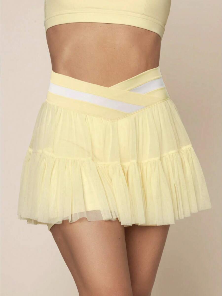 Falda plisada de cintura alta a rayas y parches estilo europeo y americano para mujeres, nueva colección de verano para deportes y yoga, con shorts incorporados - Amarillo - Ver 1