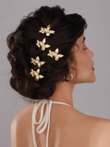 Elegante pinza para el cabello de metal con diseño de mariposa de moda