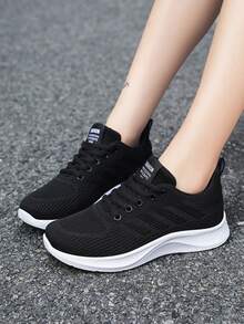 Zapatillas planas deportivas y casuales para mujer en color negro, con cordones, malla transpirable y parte superior baja para uso deportivo al aire libre - Negro - Ver 6