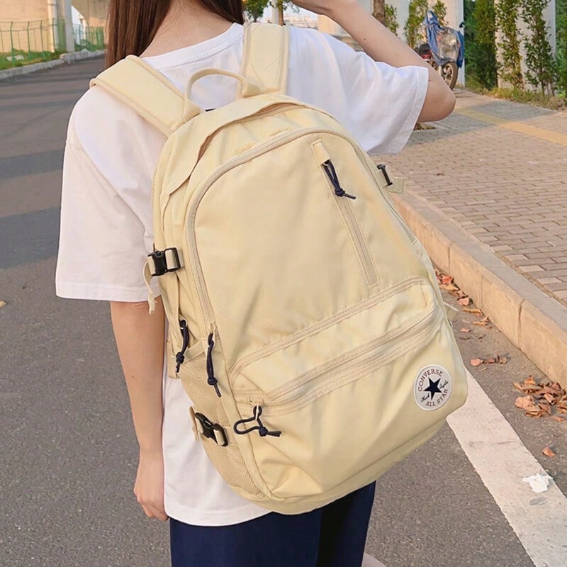 匡威男女通用背包，2026新款运动休闲户外旅行通勤基本款简约日用背包，学生书包 10021138-A11 - 黃色 - 查看 1