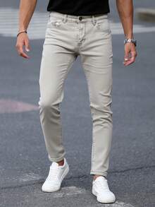 Pantalones jeans ajustados para hombres en denim gris, tela suave y elástica, ideales para estilos casuales y modernos - Gris - Ver 1