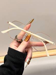 1副塑料金属几何全框新款高级多色现代简约风格变色女式时尚眼镜，适合日常生活、夏季驾驶、户外徒步、海滩露营、音乐节、约会、外出等场合佩戴，是夏季海滩度假、户外活动和旅行的时尚配饰。