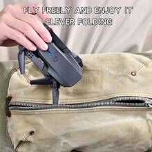 El dron está equipado con cámaras duales de alta definición, diseño plegable, posicionamiento de flujo óptico, dron de fotografía aérea de nivel de entrada, uso en exteriores, fácil de volar, regalo de vacaciones perfecto, dron adecuado para principiantes.