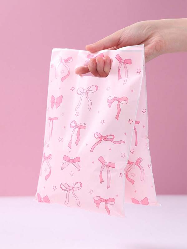 10/25/50 Piezas Bolsas de regalo con estampado de lazos rosas, bolsas de envoltura de regalo, bolsas de lona, bolsas de embalaje de regalo, bolsas de almacenamiento, bolsas de recuerdos de fiesta con lazos rosas, decoraciones de cumpleaños rosas, suministros para bodas, recuerdos de fiesta de duchas de bebé, decoración para revelación del género, decoraciones de cumpleaños con lazos, decoración con lazos rosas, suministros para fiestas festivas