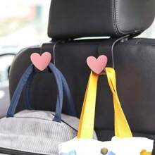 2 piezas Ganchos creativos con forma de corazón para reposacabezas de coche, organizadores de almacenamiento para el coche para colgar bolsas, carteras, bolsas de la compra, paraguas
