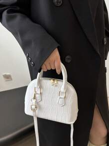 Bolsa de ombro feminina com design de concha vintage